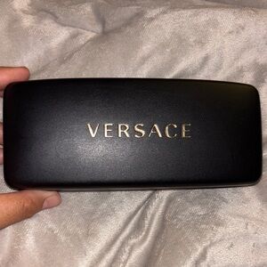 Versace Black Case with Gold Lettering
